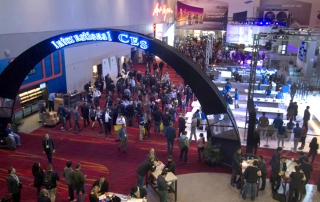 Attendees crowd at the lobby of the Las Vegas Convention Center
